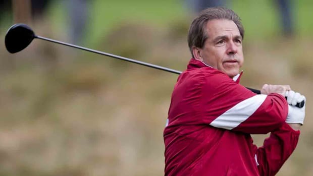 Alabama coach Nick Saban plays from the tee at the 2012 AT&T Pebble Beach Pro-Am at the Pebble Beach Golf Links in Pebble Beach, Calif.